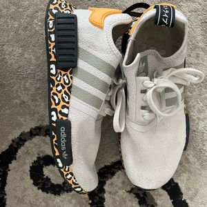 Size 7.5 adidas nmds shoes with neon orange and cheetah print